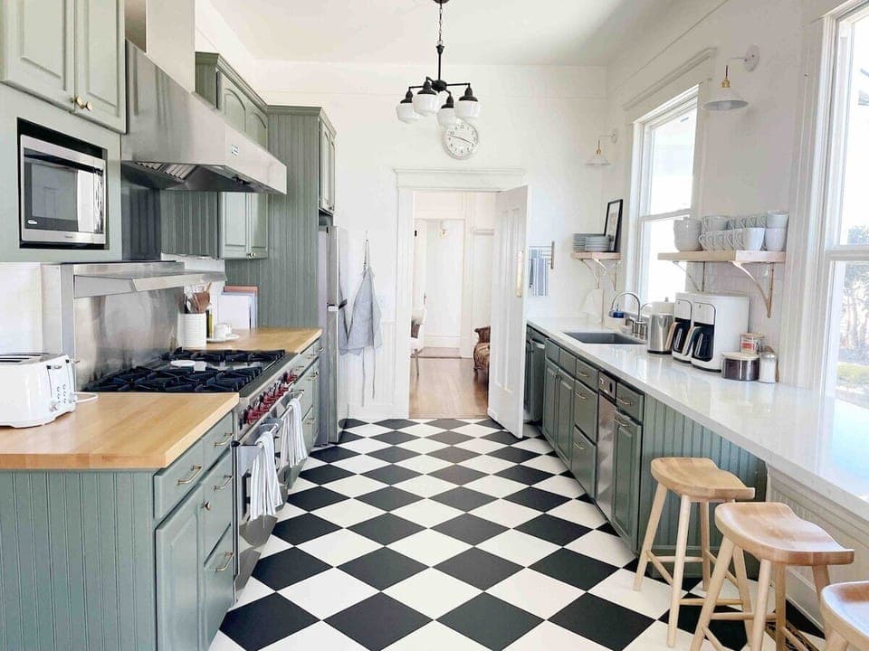 The Edna Estate kitchen is outfitted with everything a cook could want!  We provide all the cooking supplies needed: our cabinets are stocked with all the kitchen basics, even a gourmet Wolfe stove.