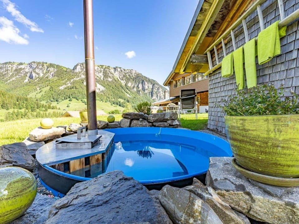 Plant, Property, Water, Sky, Building, Green, Azure, Mountain, Body Of Water, Shade