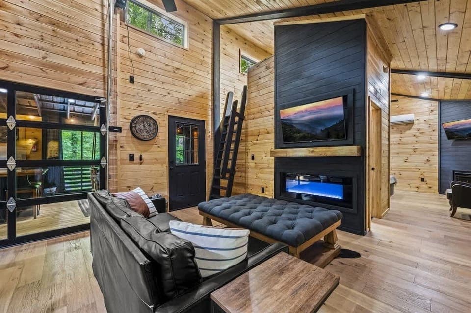 Kitchen vantage point featuring the den and garage door to the porch.
