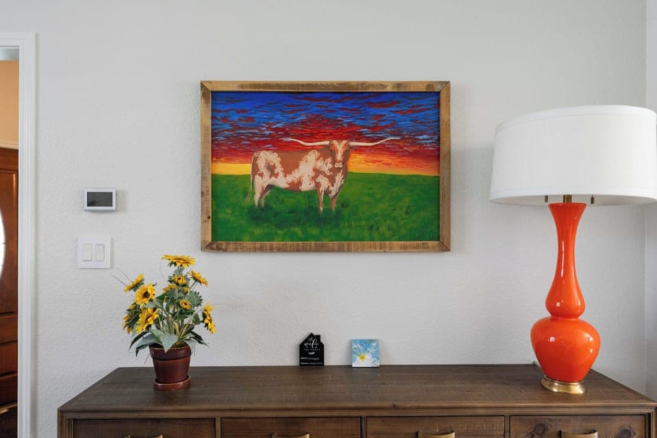 Artwork, above credenza
