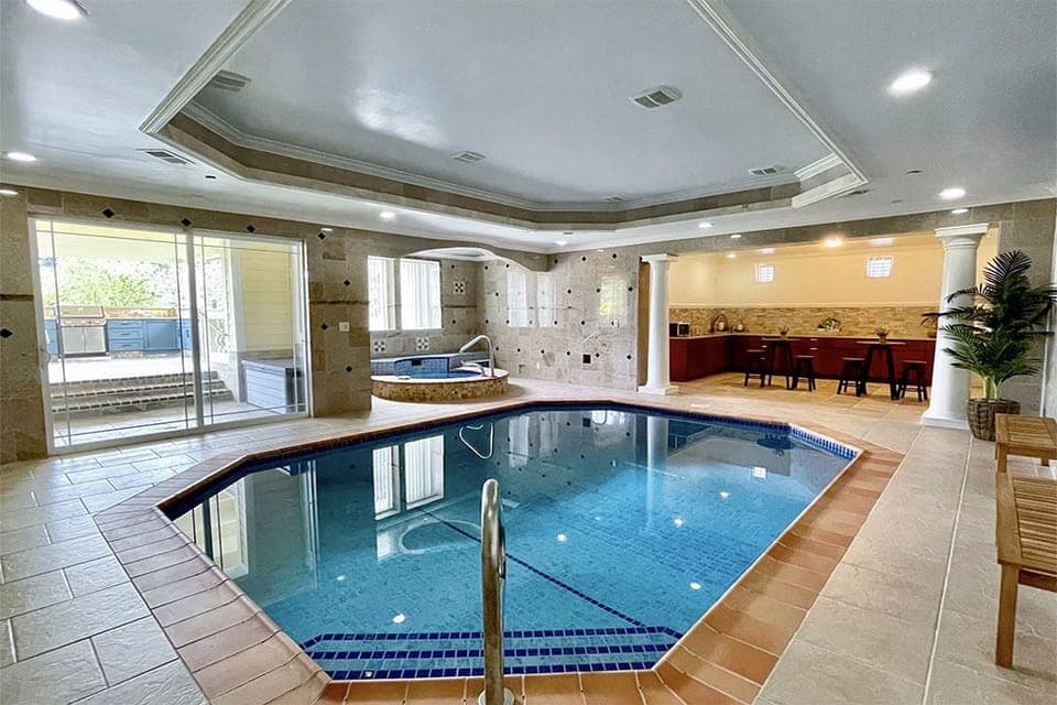 Downstairs indoor pool and NOIN jetted hot tub. 