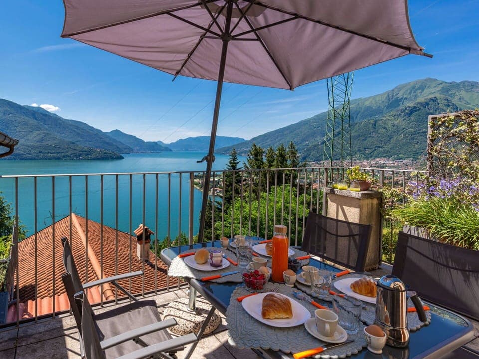 Sky, Mountain, Daytime, Building, Plant, Natural Landscape, House, Vegetation, Highland, Tree