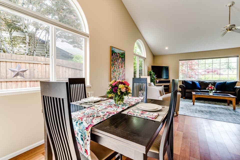 Dining table and chairs with expandable feature to accommodate friends/family