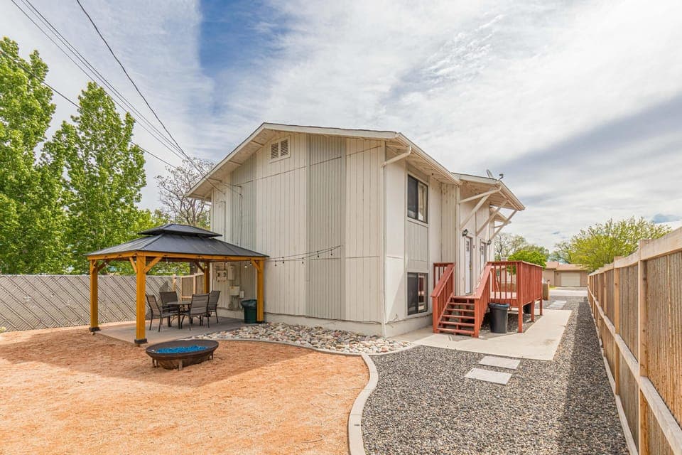 Private patio area with fire pit, BBQ grill, outdoor dining, and more! Perfect for a summer vacation!