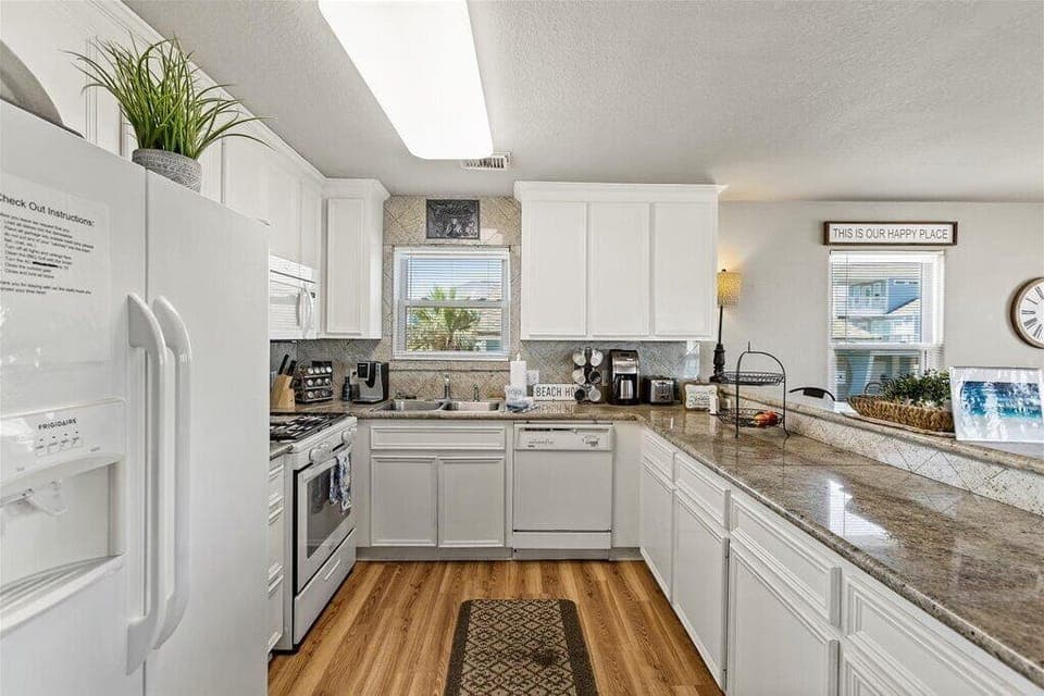 Sunlit haven with granite countertops and modern appliances!