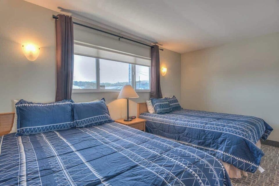 Two queen beds in the private bedroom