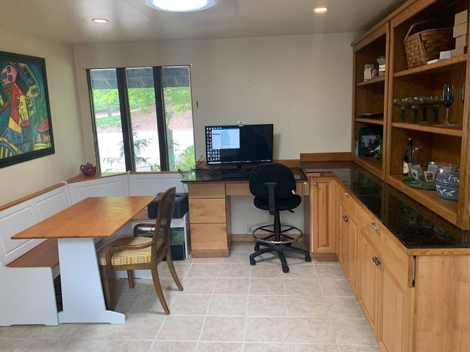 Other side of kitchen, with breakfast nook and office/crafts space