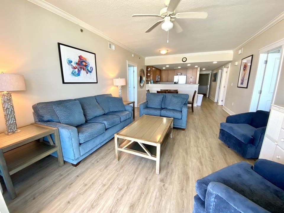 Living Room w/couch and loveseat along with 2 swivel chairs 