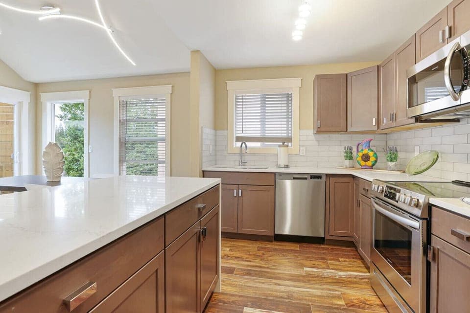 Open modern Kitchen Design.Oversized deck with a view of Star LakeSeattle /Tacoma Area.