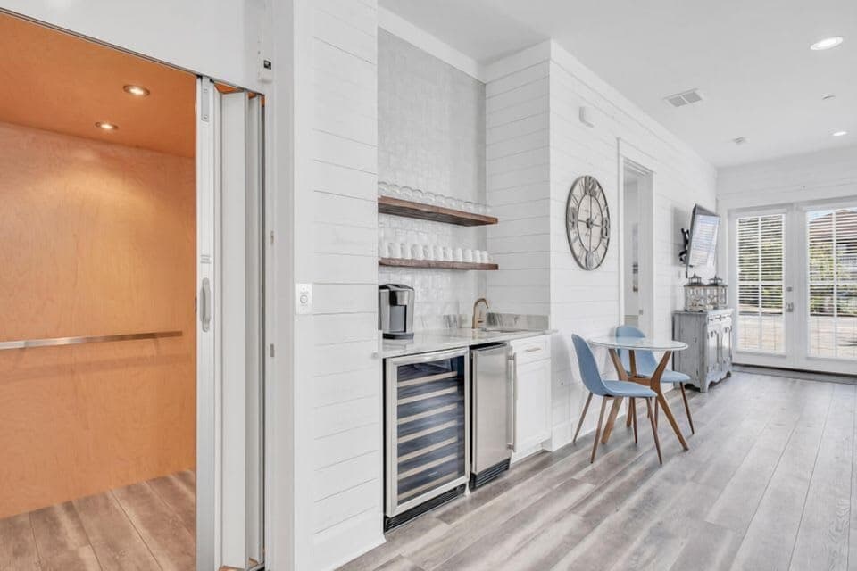 Welcoming entry hallway w/ sleek finishes & a light, open feel.
