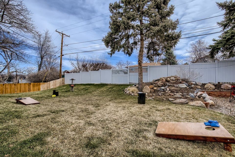 Back yard games included a disc golf hole, bags, and can-jam. 