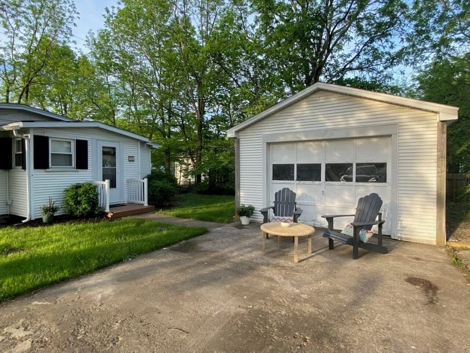 Outdoor furniture-dining table & chairs for outdoor enjoyment located in shed