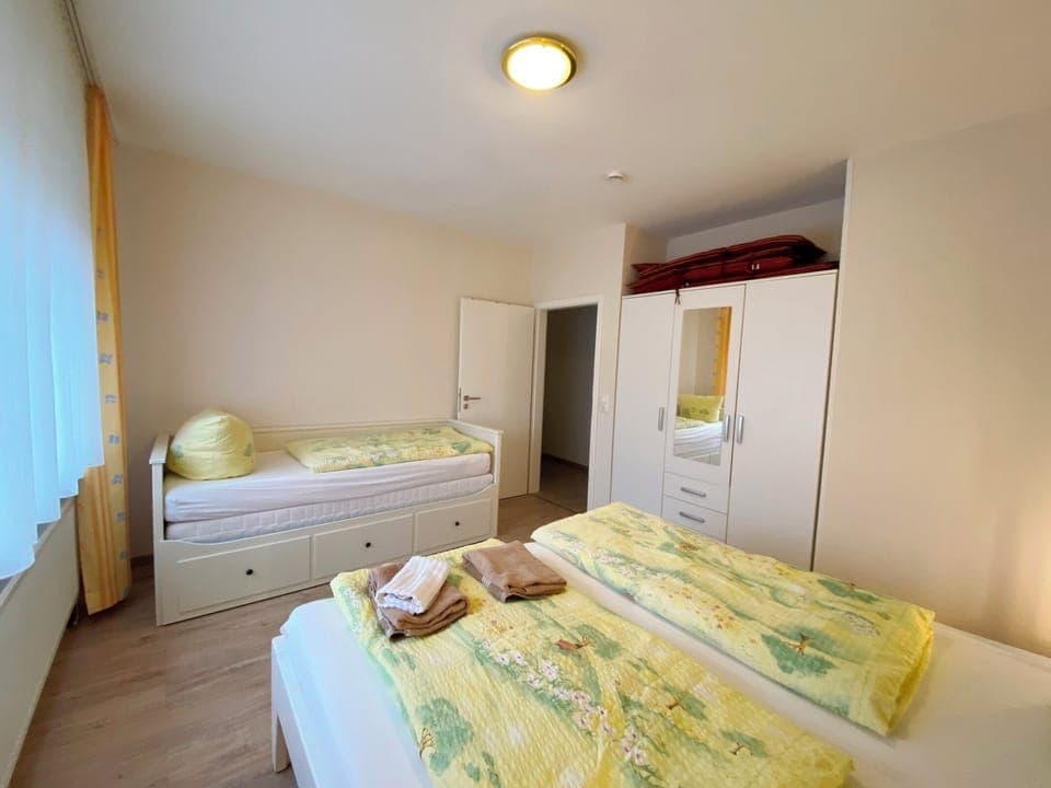 Bedroom, Double bed, single bed and wardrobe