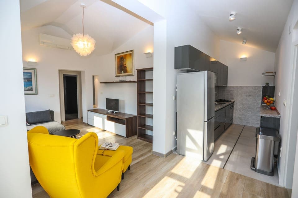 Living room and the kitchen.