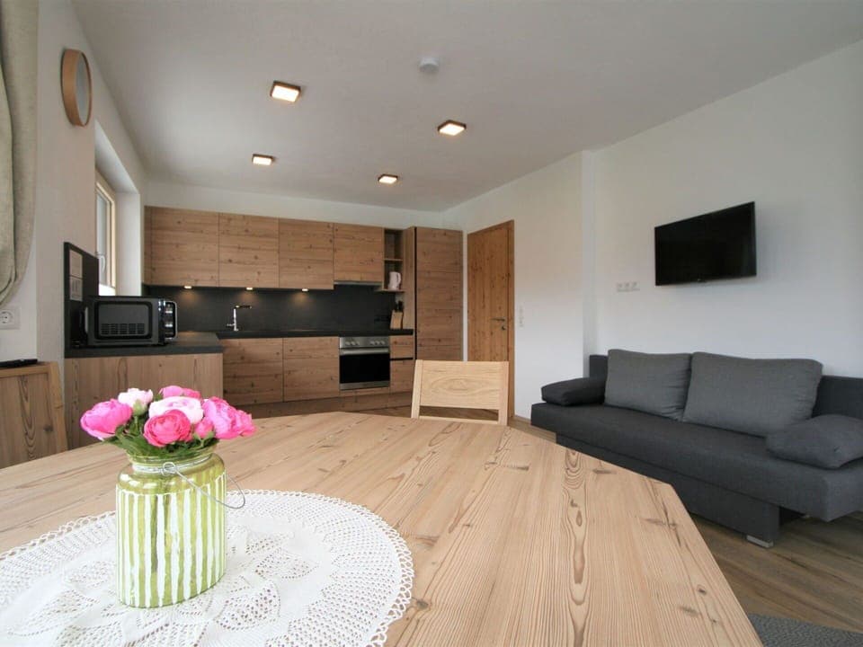 Flower, Furniture, Property, Comfort, Cabinetry, Table, Wood, Building, Living Room, Flooring