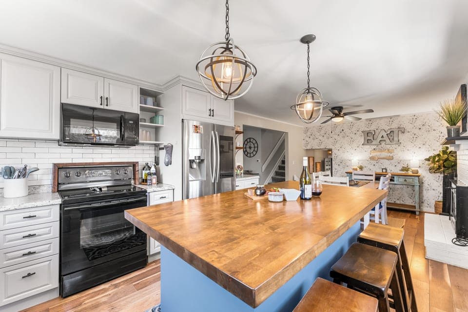 Fully stocked kitchen with island seating