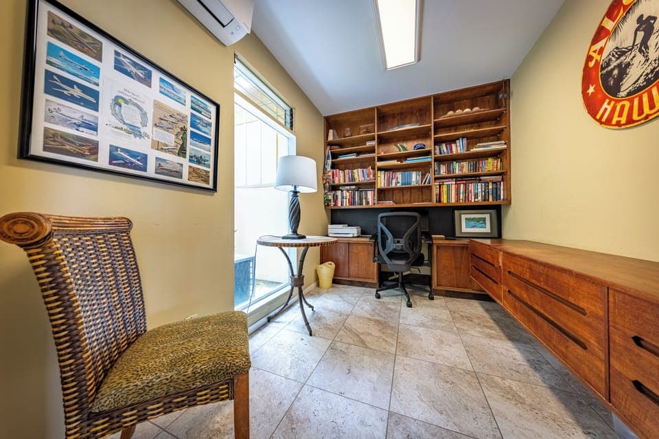 Office with tons of books and games!