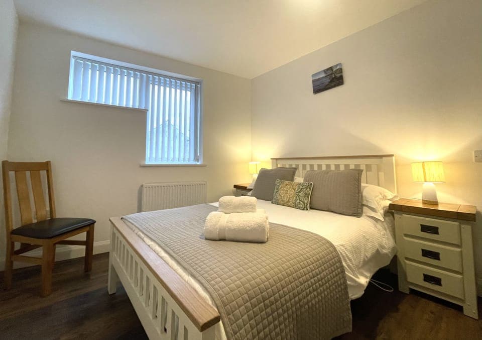 Have a restful sleep in the comfortable double bed at Sam's Cottage