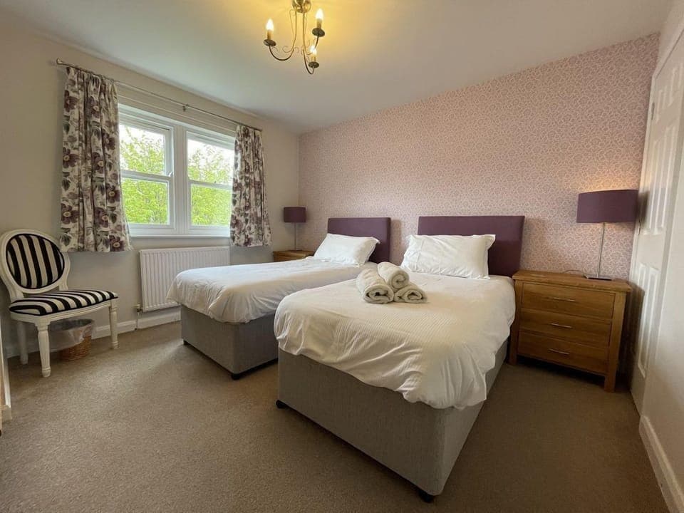 The twin room is very spacious and has ample storage for luggage