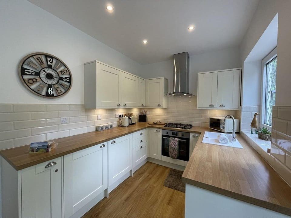 The modern and spacious kitchen is equipped with everything that you need for your self catering holiday
