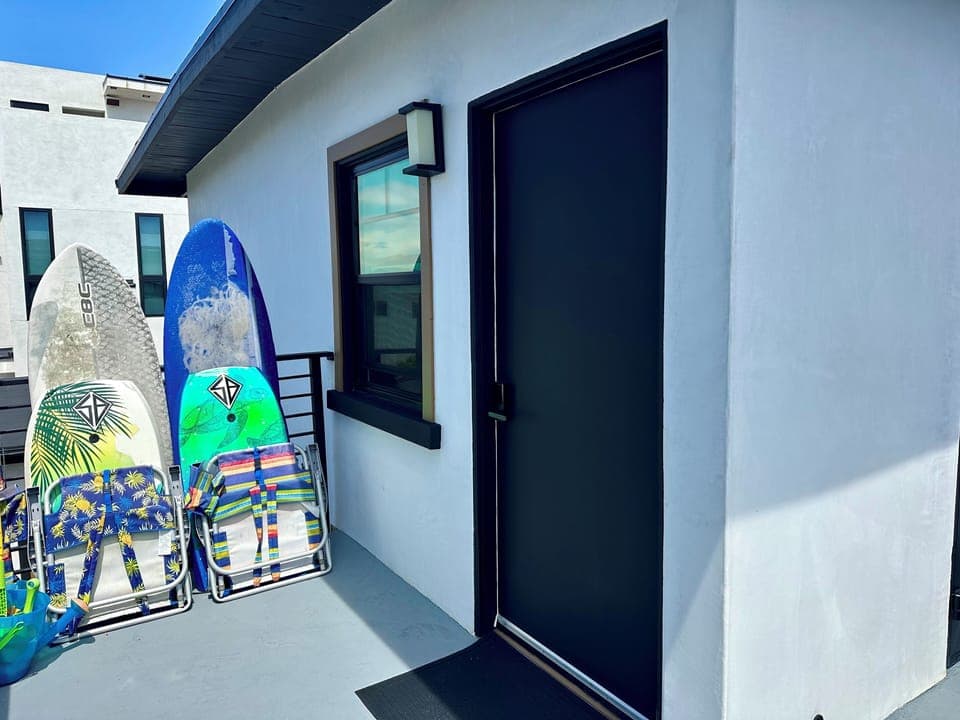 Surfboards, boogie boards, chairs, umbrella's and sand toys available for use 