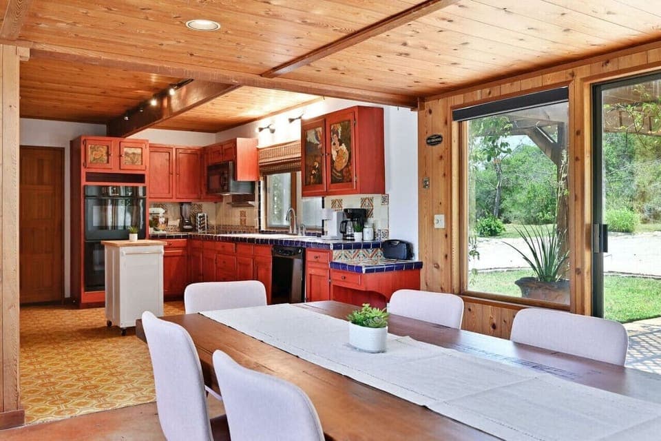 Spacious kitchen and dining for family meals in Austin vacation rental