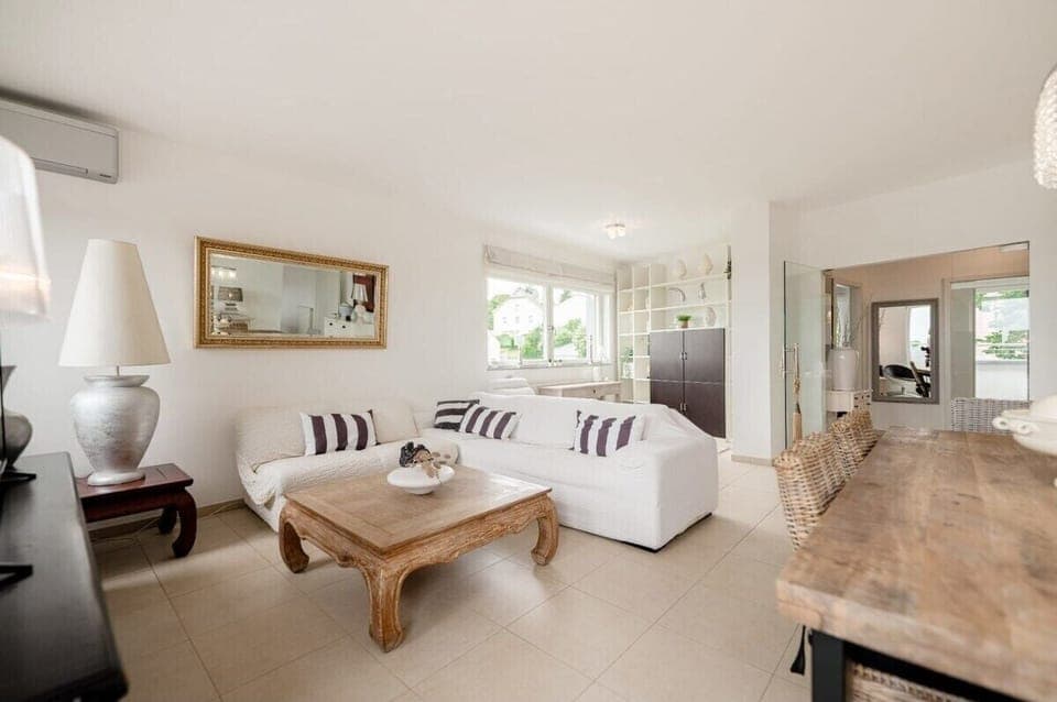 Sink into comfort in our chic living space, perfect for unwinding after a day of exploration.