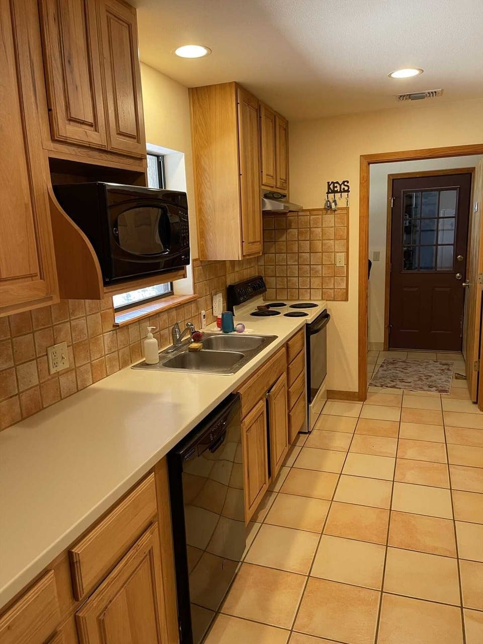 Not only will you have a grill outside, but a full country kitchen with appliances, utensils, cookware, and serving ware inside!