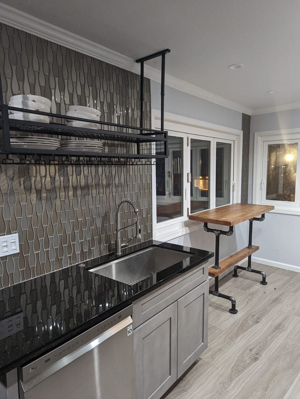 Large sink and dishwasher.  Corner pub table provides great views 2 people watch