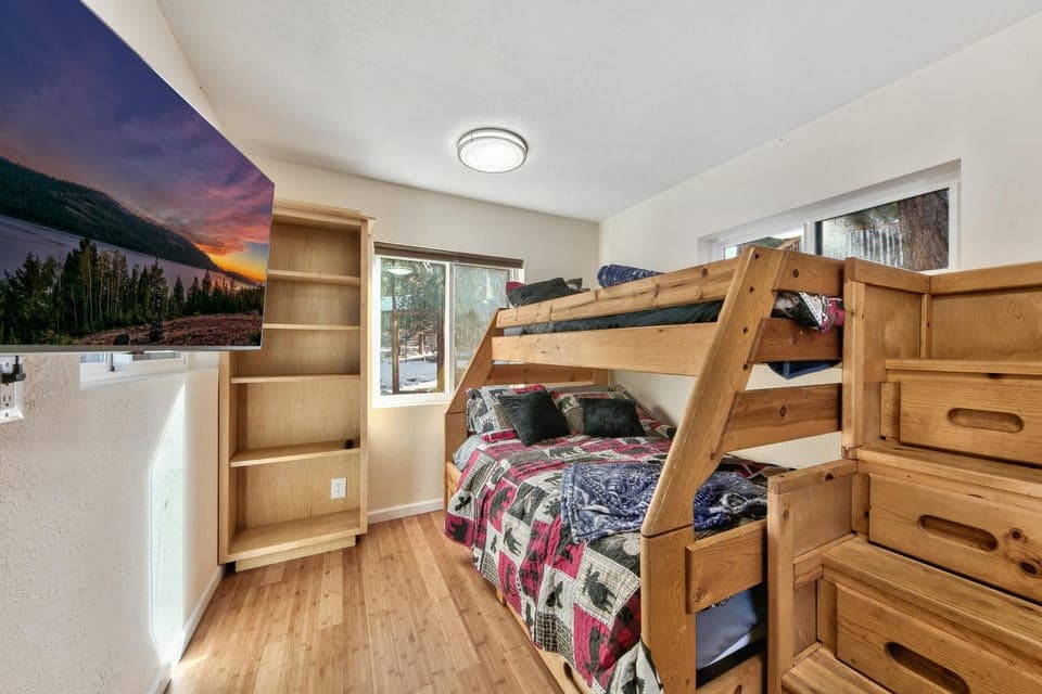 4th bedroom (detached from home) offers a bunkbed with full & twin beds & TV.