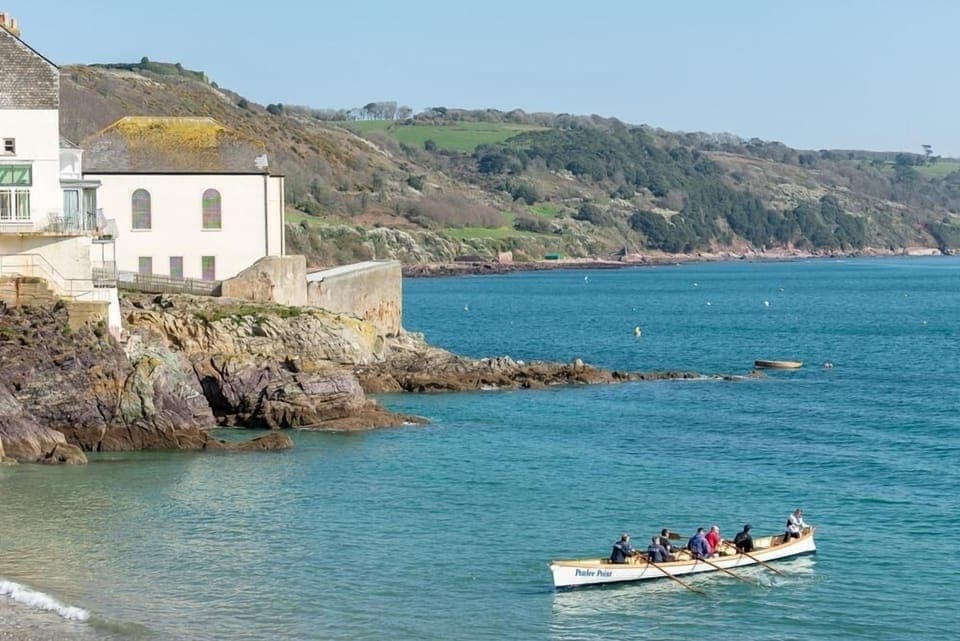 Gig rowers at 3 The Bay, Cawsand, Cornwall