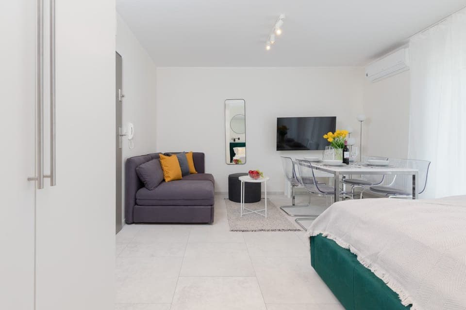 The living area's decor combines elegance with functionality. 