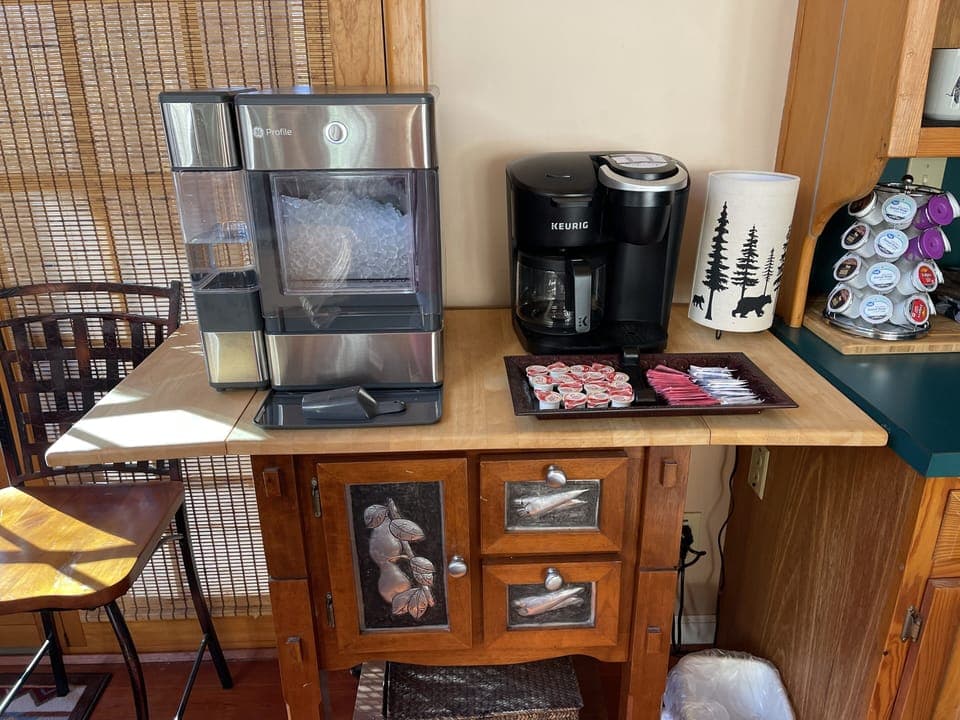 Fully stocked coffee bar, and GE Profile Ice maker, for drinks or ice coffees