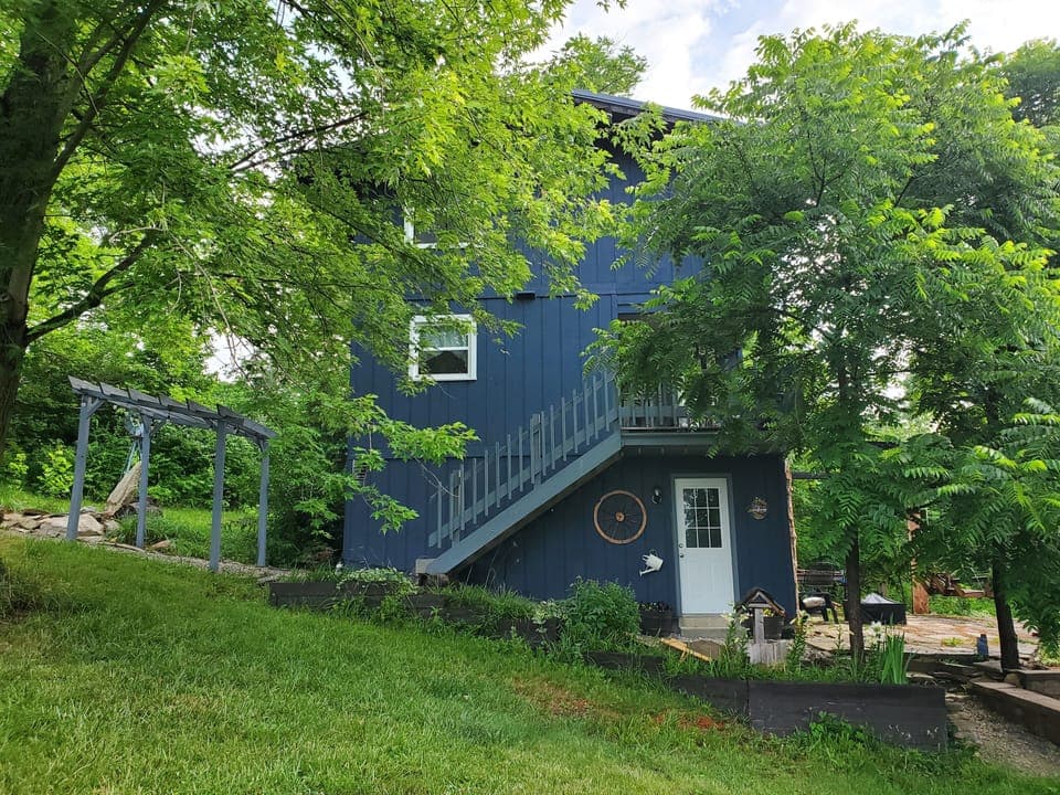 Garden Flat listing is lowest level, white door entry.