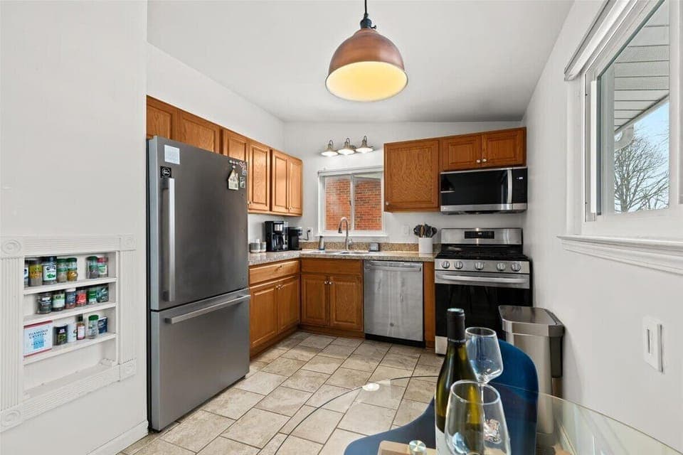 Cook with ease in a fully stocked kitchen with new modern appliances.