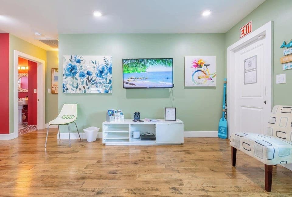 The living room is designed to provide a comfortable and stylish space for relaxation and entertainment. The room is tastefully decorated with mode