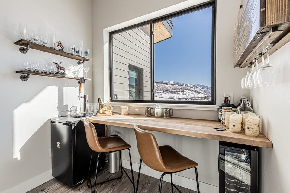 At the top of the stairs, a handmade bar with gorgeous views!