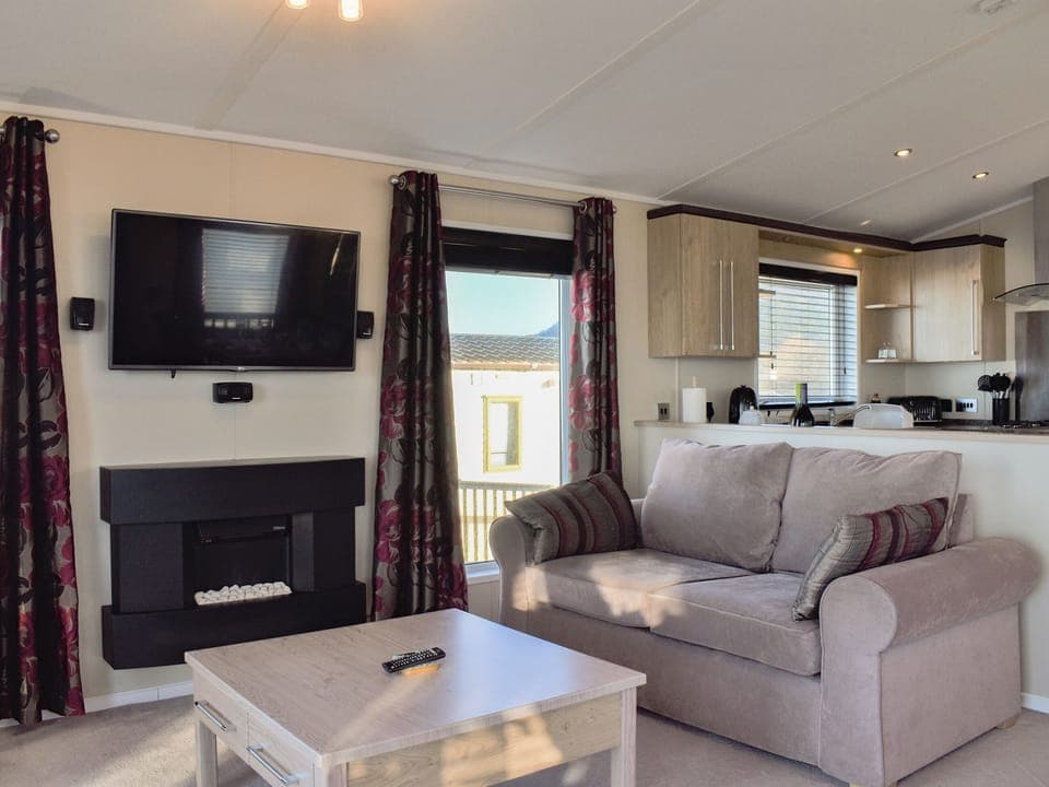 Living area | Victoria Lodge - Bron Y Wendon Holiday Park, Llanddulas, near Llandudno