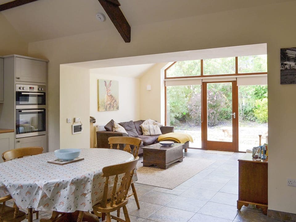 Open aspect from the kitchen/diner to the living area | Lili Wen - Neuadd Wen Cottages, Llanfachraeth, near Holyhead