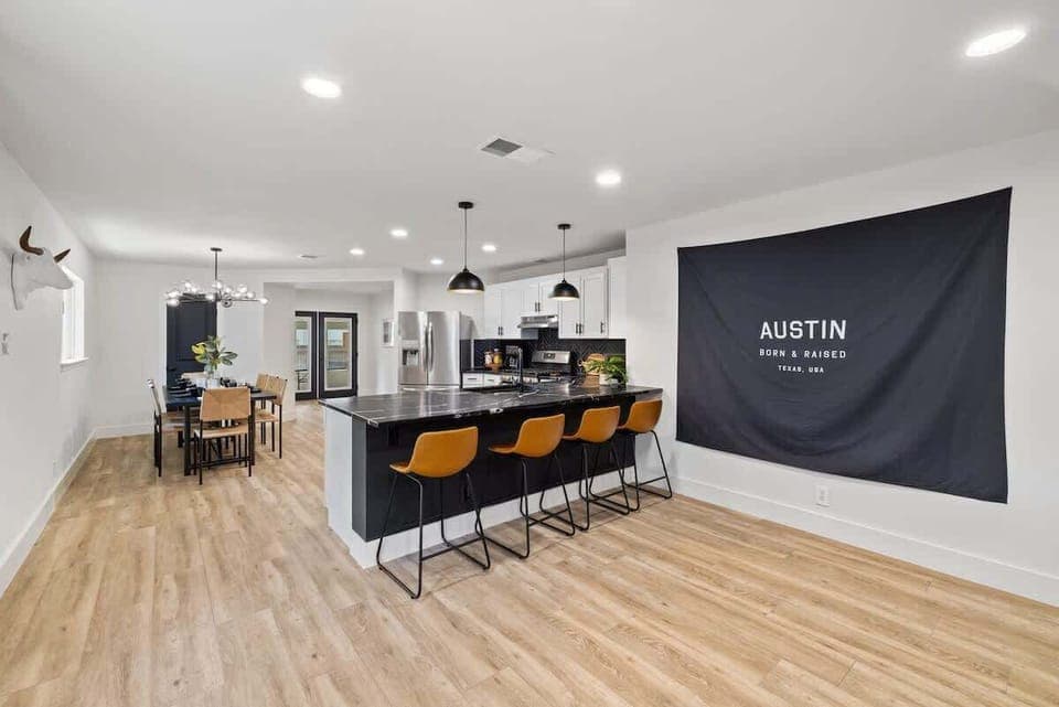 Beautiful kitchen with ALL the amenities, with bar seating for four and dining seating for 8.