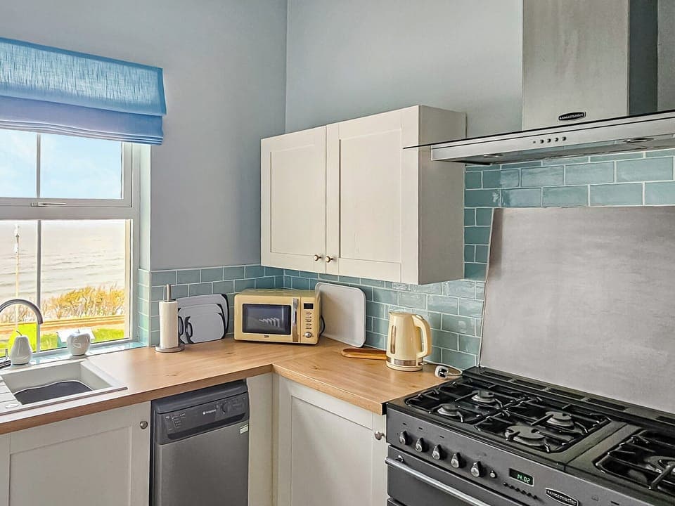 Kitchen | Seaview Cottage - Bron Y Wendon Holiday Park, Llanddulas, near Llandudno