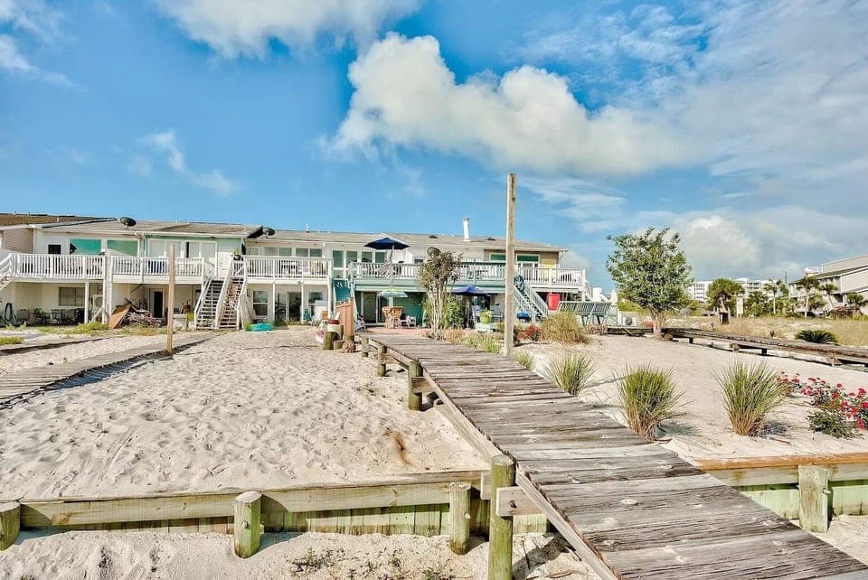 Sandy beach off the patio