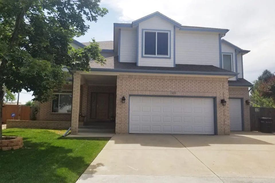 Parking in driveway up to four cars. Front door main access to home. 
