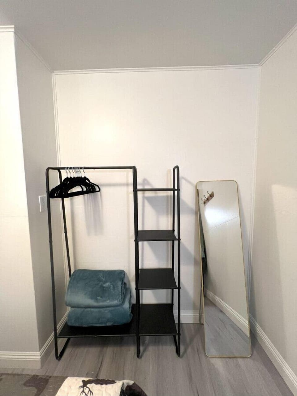 Modern Outdoor closet with extra warm blankets and mirror provided.