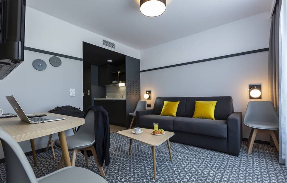 Relax on the comfortable sofa after a day outside.