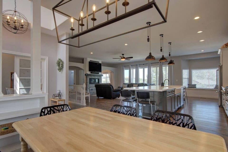 Adjacent dining table to the large kitchen 