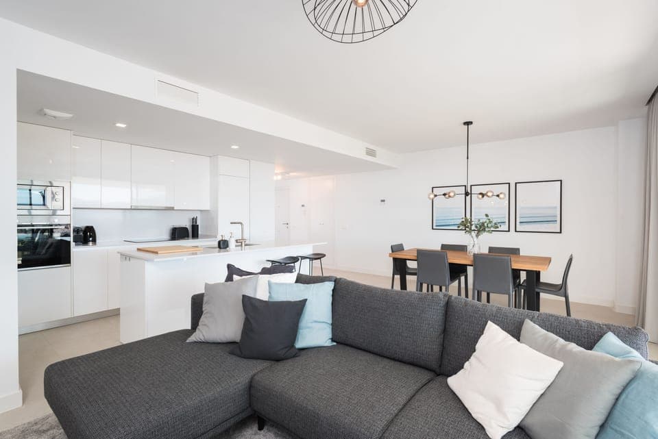 Sofa and the kitchen area to the left