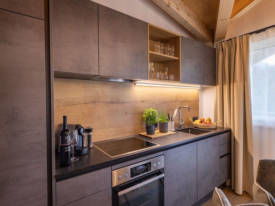 Cabinetry, Property, Countertop, Building, Kitchen, Kitchen Stove, Kitchen Appliance, Wood, Curtain, Home Appliance