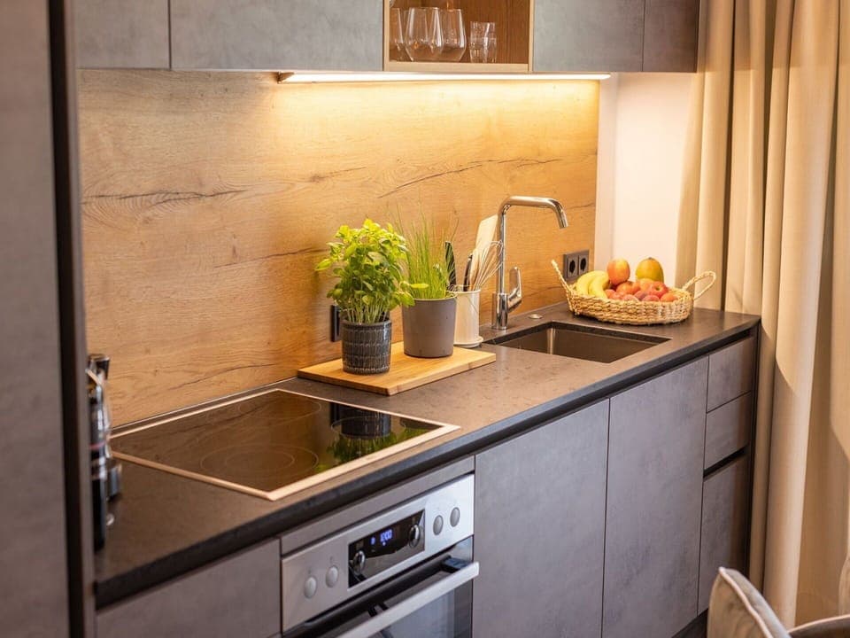 Countertop, Cabinetry, Kitchen Sink, Tap, Furniture, Property, Sink, Kitchen, Plant, Wood