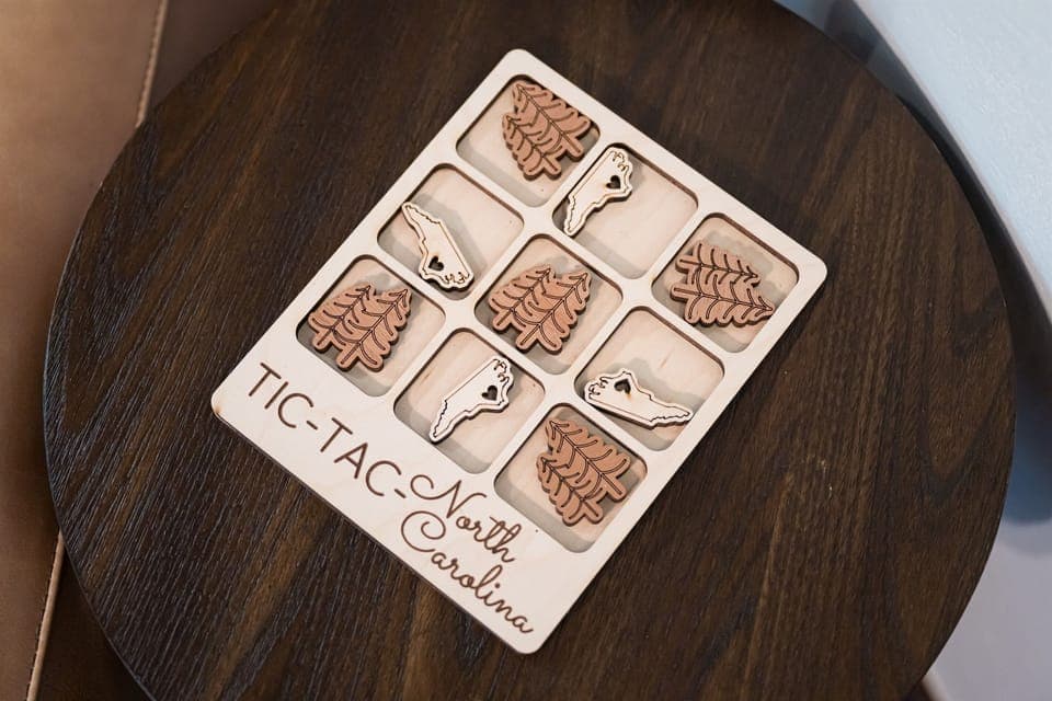 Enjoy the custom made NC tic-tac-toe in each guestroom